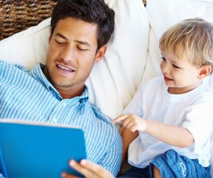 father and son reading